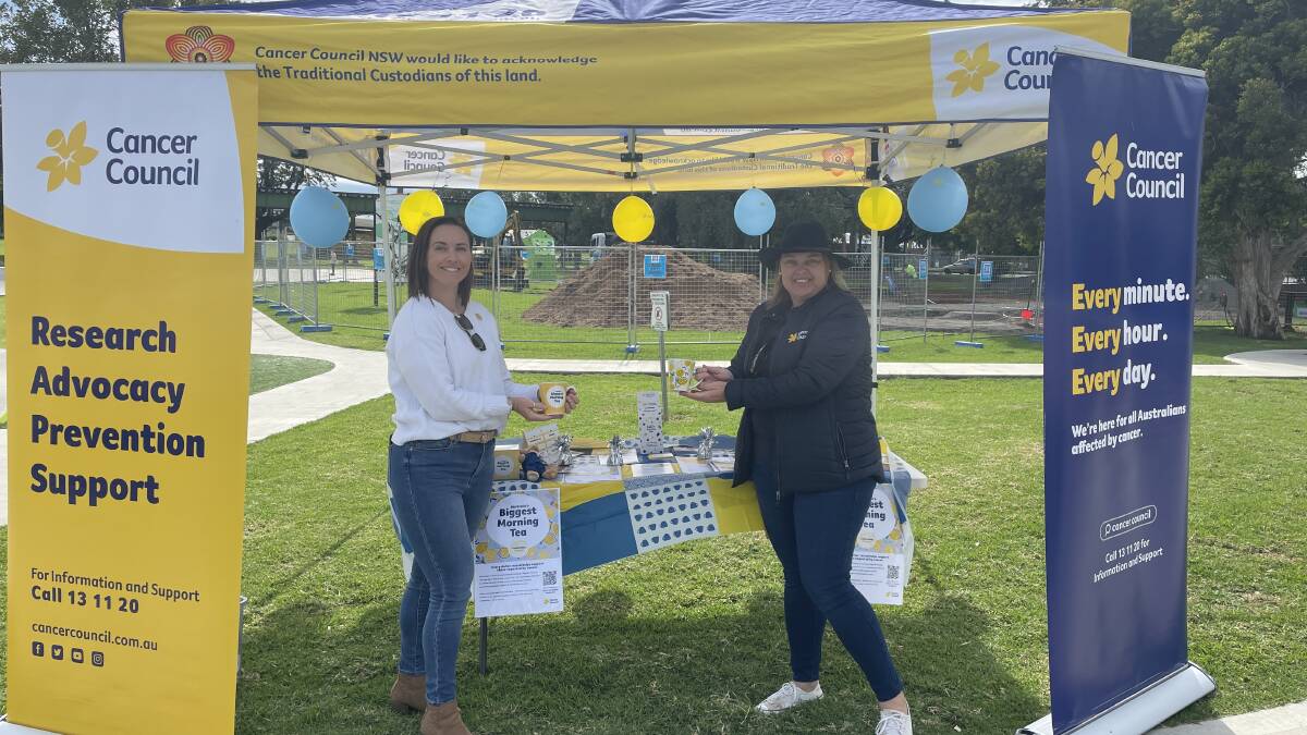 Cancer council's Sarah Mayo-McCowen and Kate Dubois ran an info booth in Viaduct Park from the early hours of Tuesday morning. Picture by Jonathan Hawes