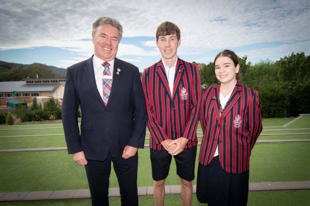 Calrossy Anglican School principal David Smith and the 2024 Calrossy school captains Tom Aitken and Olivia Coombes. Picture by Gareth Gardner