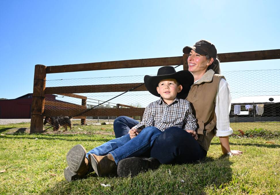Rianna Winters and her son Rhett Winter on their property just out of Tamworth. During the week Rianna is a full-time mum and on the weekends she is a wedding celebrant. Picture by Gareth Gardner 