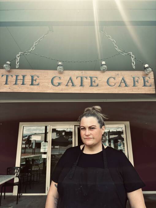 Kay Billingham, The Gate Cafe owner, says the sewerage is coming up through the grass. Picture supplied