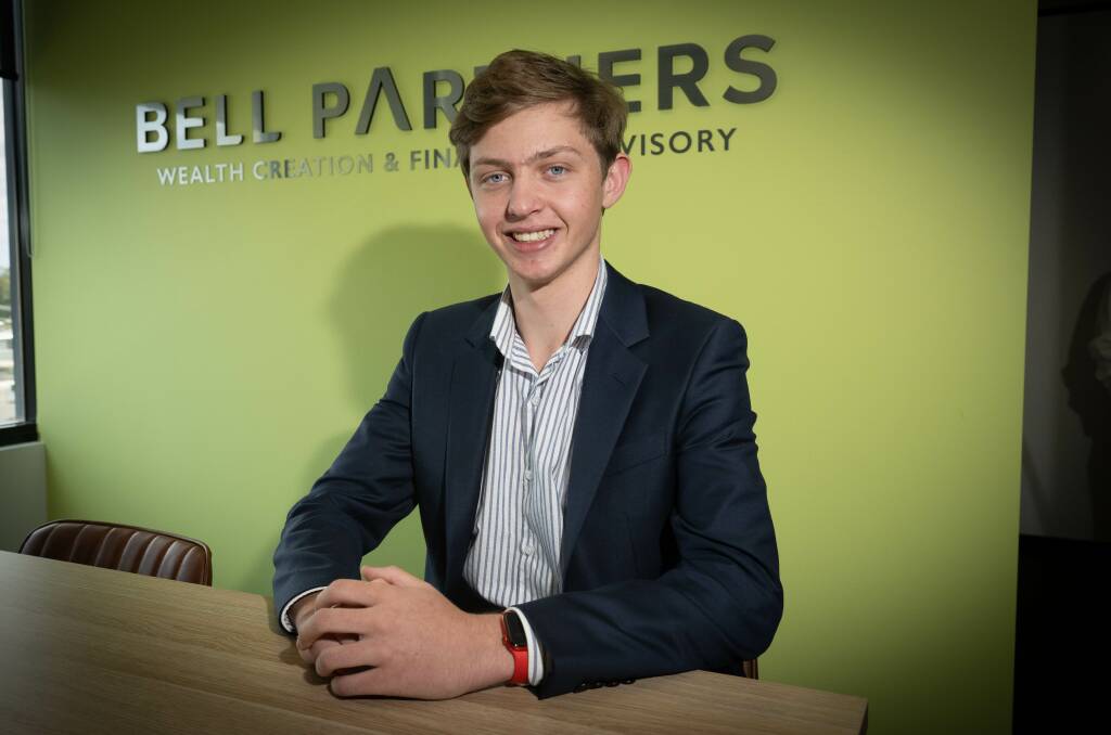 Lewis Shepherdson waited to recieve his marks with Bell Partners co-workers. Pictuer by Peter Hardin