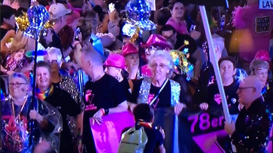 Bob reconnects with all the 78'ers at the most recent Mardi Gras, as they march the street like they did 46 years ago. Picture supplied