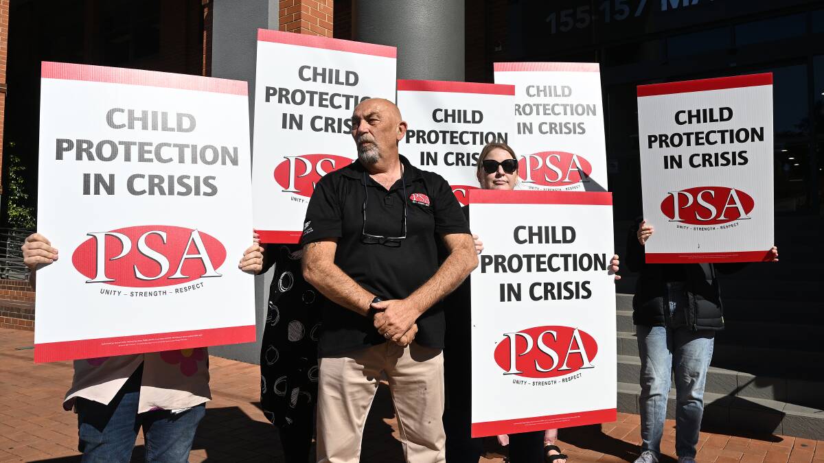 PSA regional organiser for the North West region Stephen Mears and New England child protection caseworkers protest staff shortages. Picture by Gareth Gardner