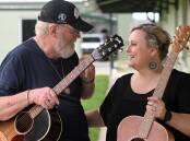 Fellow mentors Allan Caswell and Lyn Bowtell discuss performing at Tamworth Country Music Festival. Picture by Gareth Gardner