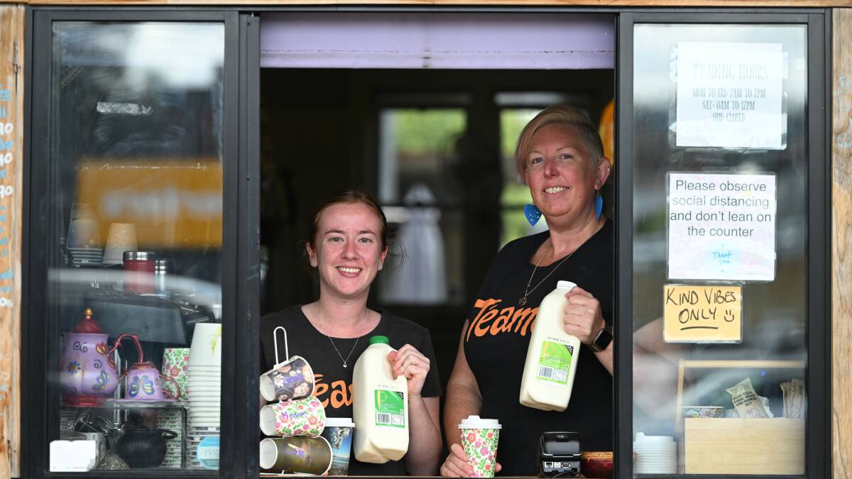 Teamo staff Emily Castles and owner Prue Russ hold the liquid gold for their coffees, Peel Valley Milk. Picture by Gareth Gardner