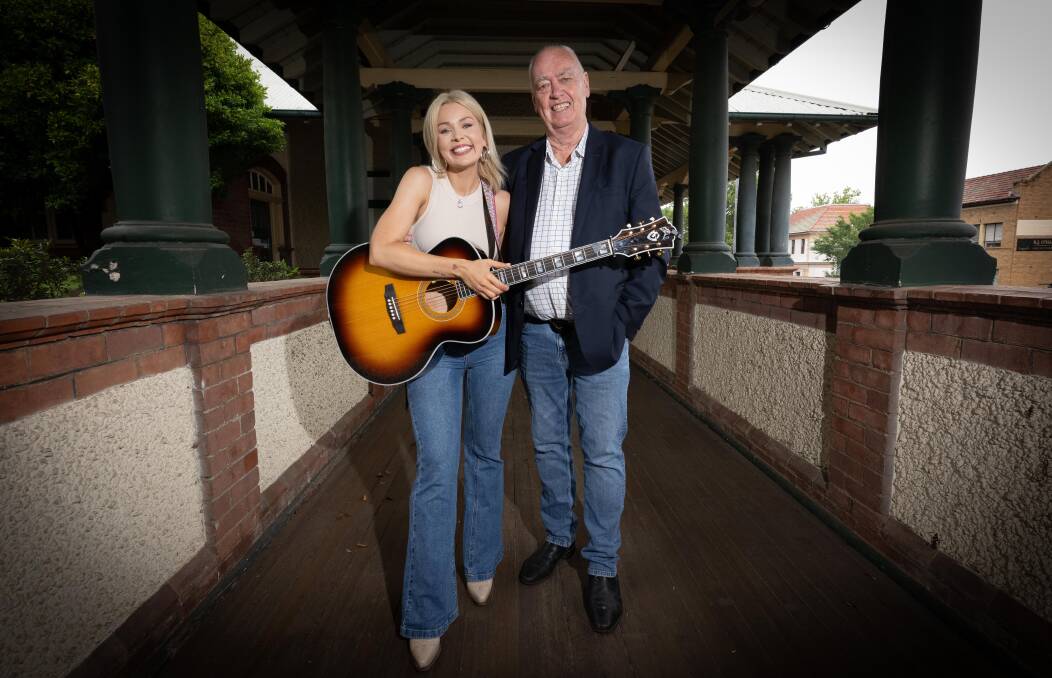 Max Jackson and TRC country music festival manager Barry Harley, says she is the embodiment of the Tamworth music industry. Picture by Peter Hardin. 