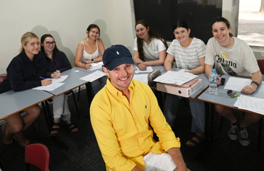Year 12 Calrossy students prepare for the HSC, Grace O'Mullane, Annabel Burgess, Sophia Hanson, Arabella Scanlon, Grace Holland and Lexie Cutler, with teacher James Forsyth. Picture by Gareth Gardner