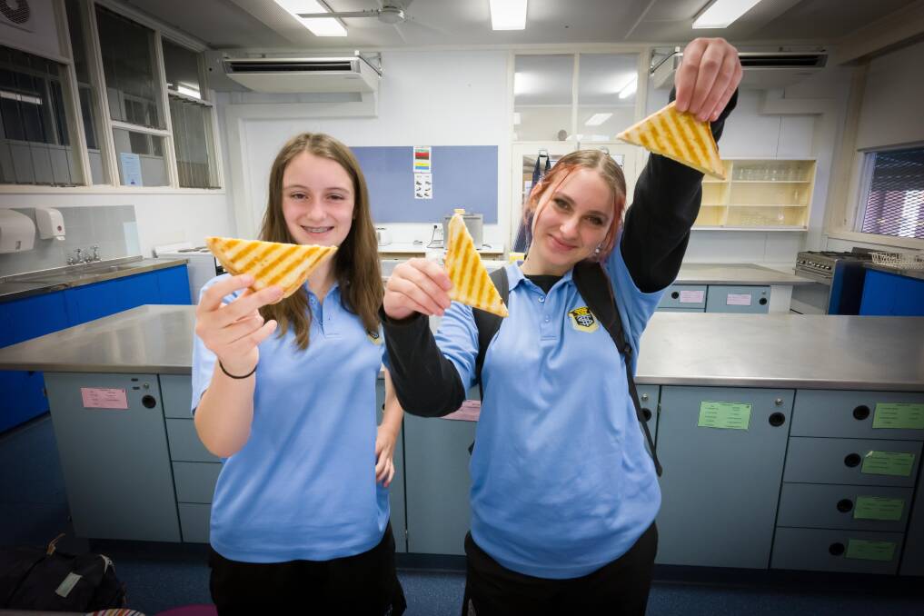 Tamworth High students Katelyn Bruce and Lily Young are among the Tamworth High students who join their friends for a catch up at the school's Breakfast Club. Picture by Peter Hardin