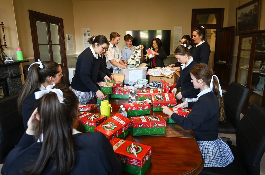 Calrossy students have packed almost 200 gift boxes for Operation Christmas Child, which will be donated to children in South East Asia and the Pacific Islands. Pictures Gareth Gardner