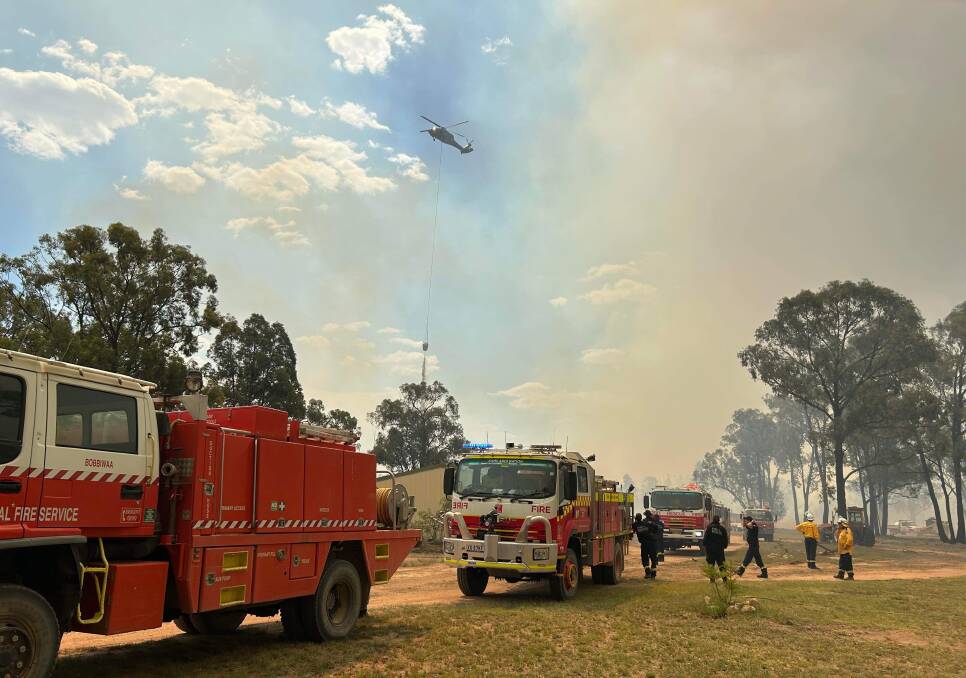 Hundreds of firefighters have worked round the clock to contain the bushfire. Picture by Nic Hann