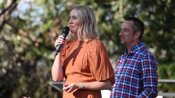 The Chapel Collective pastor Linnea Barlow welcomes the large crowd to the Good Friday service at Tamworth's Oxley Lookout. Picture by Gareth Gardner