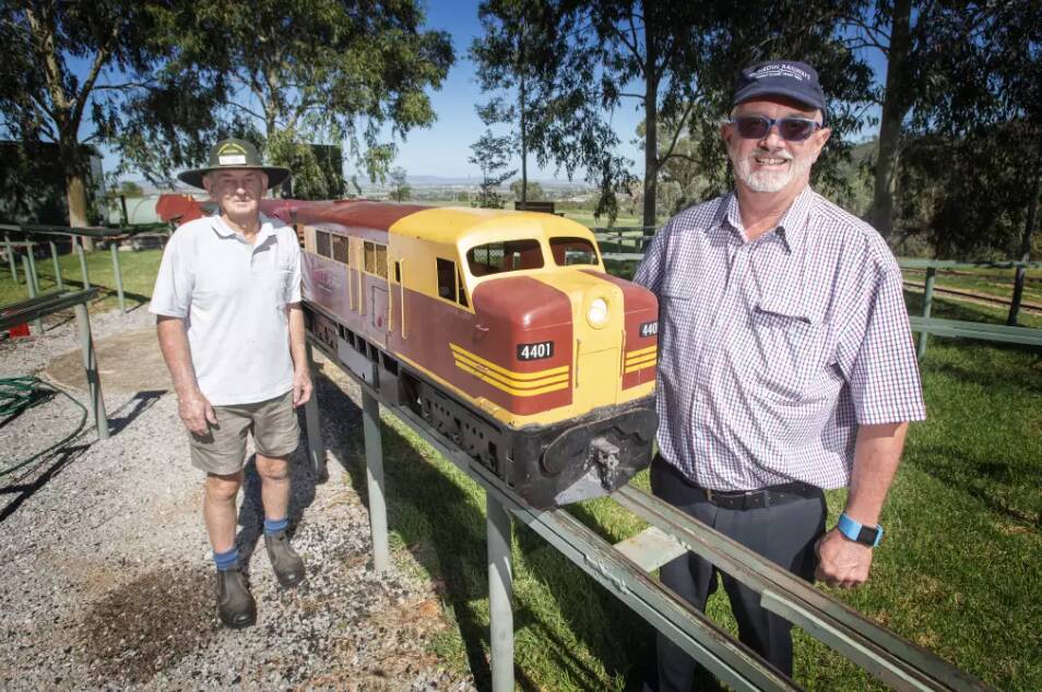 Tamworth and District Model Engineers' David Scott and Jim Booth with one of the miniature trains. Photo: Peter Hardin