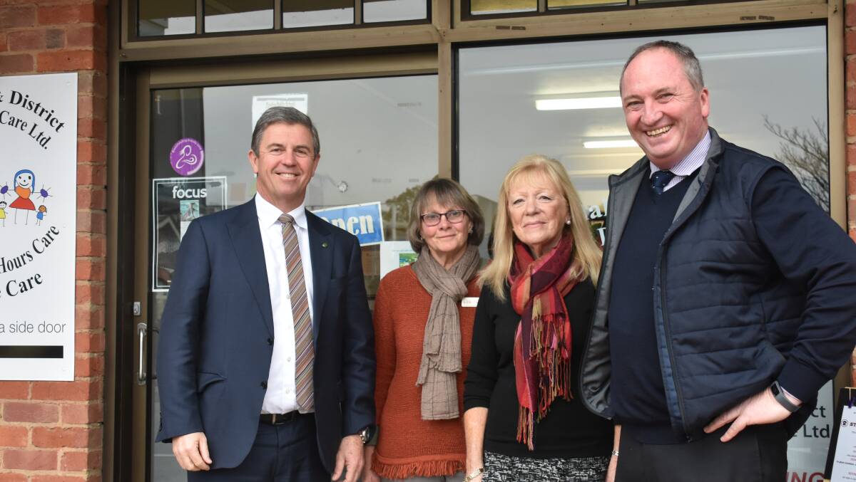 SMILES: Assistant Minister for Children and Families David Gillespie with Armidale and District Family Day Care's nominated supervisor/coordinator Sue Evans, business manager Pat Marson and New England MP Barnaby Joyce at the launch.