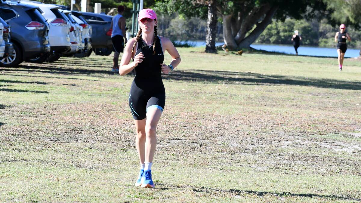 Tamworth's Sarah Collison heads to the line in the Girls Only Triathlon conducted by the Forster Tri Club at Forster. She finished second. Picture by Scott Calvin.