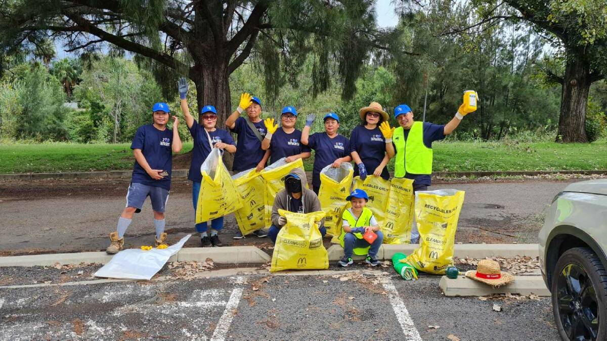 All hands on deck: Volunteers of Northern Settlement Services cleaning up on Sunday, March 6. Photo: Supplied