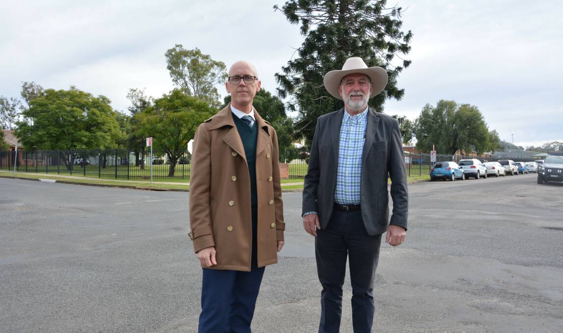 Road fix: Tamworth Regional Council's manager of operations and construction, Murray Russell and mayor Russell Webb on the corner of Dean Street and Johnston Street. Photo: Caitlin Reid