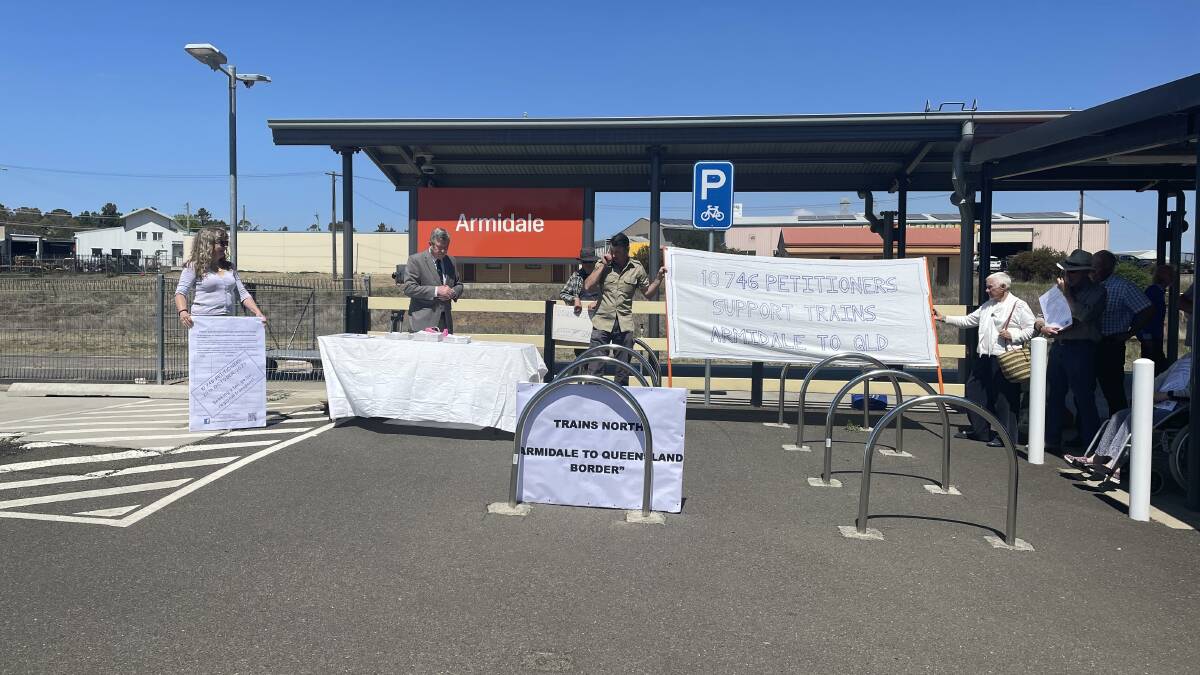 Protesters rallied at Armidale Railway Station in October 2023, calling for the restoration of train services between Armidale and Jennings-Wallangarra. Picture from file.