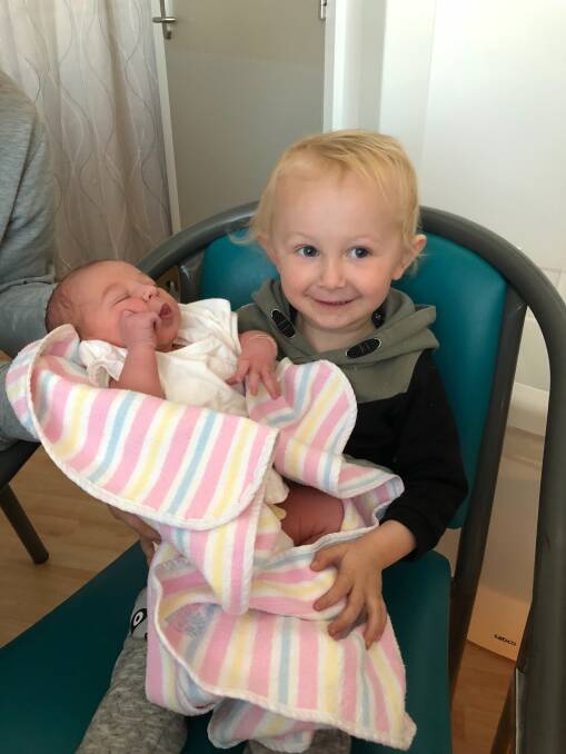 New arrival Fletcher David with big brother Xavier.