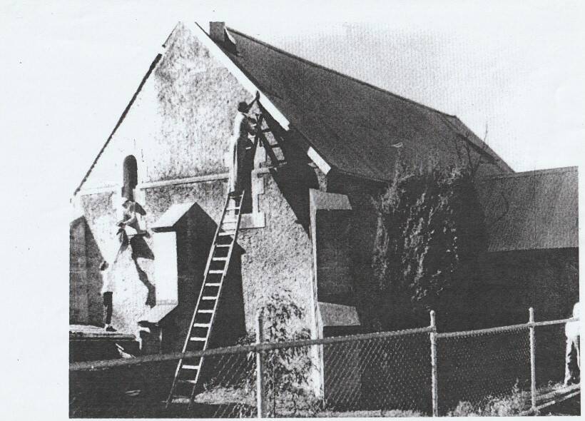 Class is in: Men at work on what was then the Retreat Theatre building on the Bridge/Ebsworth St corner, originally the 1857 Denominational School. Photo: Supplied