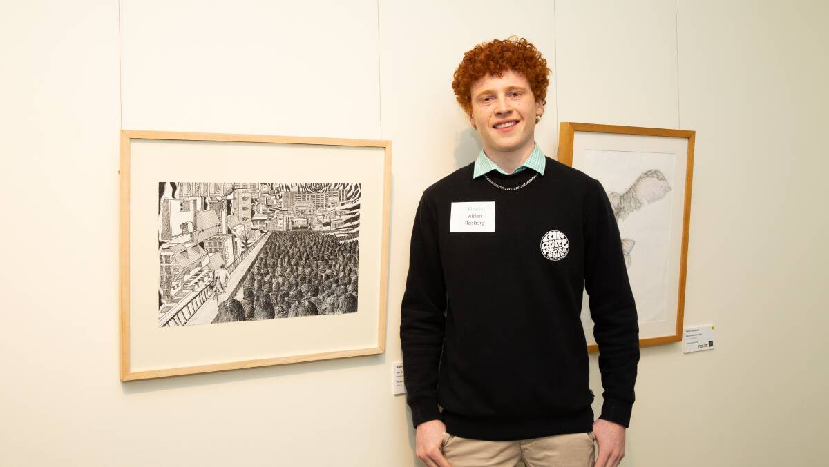 Finalist Aidan Rosberg, from year 12 at TAS with is artwork 'The Dissenter'. Picture by Simon Scott