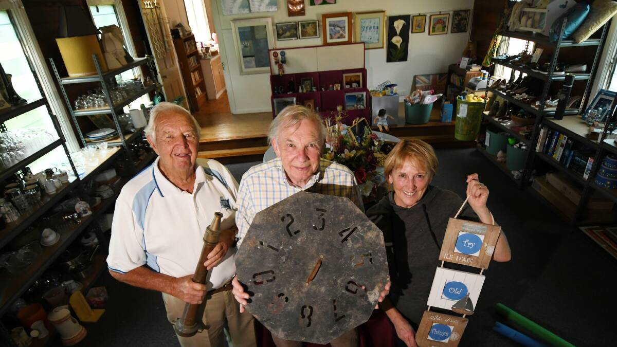ON SALE: Doug Crowell, Tony Orr and Evelyn Keane with what's on offer at the new op shop. Photo: Gareth Gardner