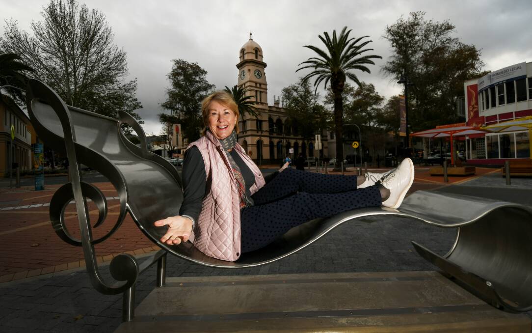 NEW NOTES: Councillor Juanita Wilson with the new musical ribbon bench in the CBD. Photo: Gareth Gardner 220620GGB01