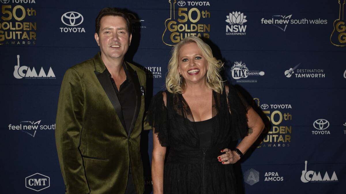 Honoured: Beccy Cole with Adam Harvey on the red carpet at the Golden Guitar Awards in Tamworth. Photo: Gareth Gardner