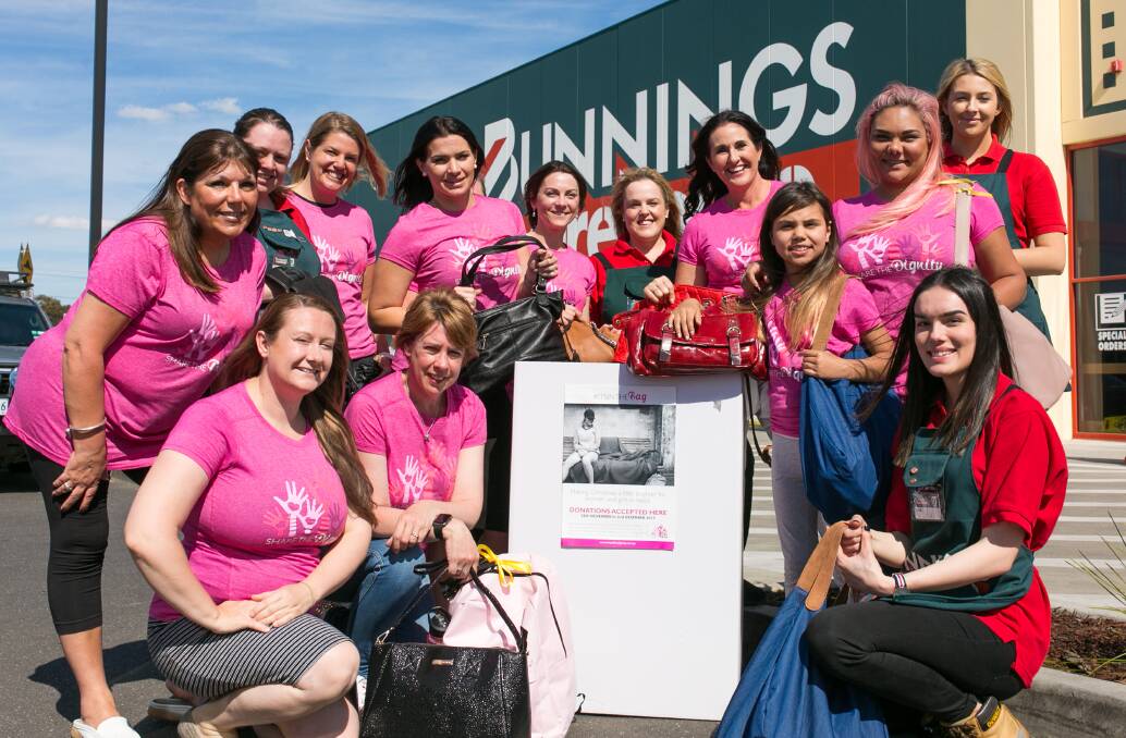Christmas spirit: Bunnings team members with share the dignity volunteers. Photo: Supplied.