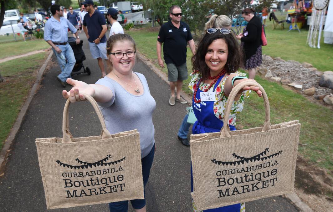 BRAND NEW BAG: Tiffany Webster and Sarah Jane-Bonner bagged a special market jute bag in 2017. 031217GGA016