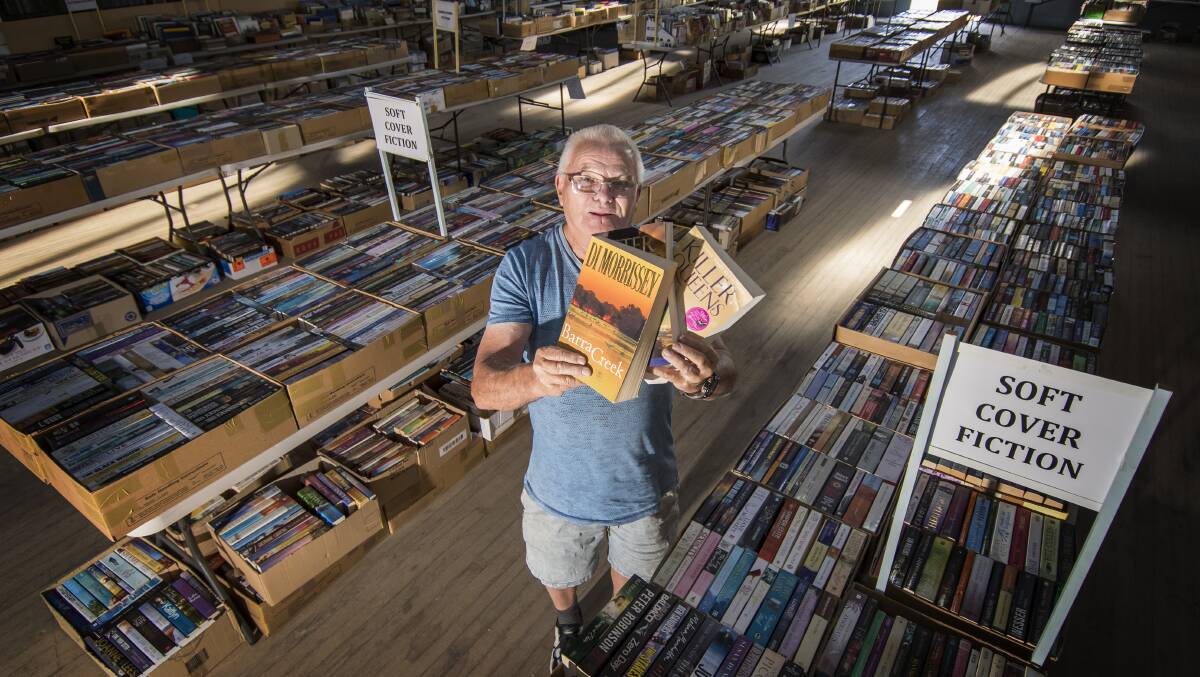Giant book sale: Allan Orchard - Vice Chairman says there's plenty to chose from. Photo: Peter Hardin, 091118PHB028