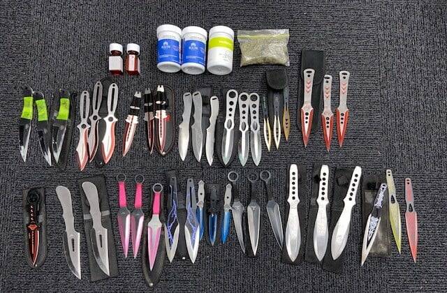 Knives and containers seized by police during a random roadside stop near Tamworth last month. Photo: NSW Police Force.