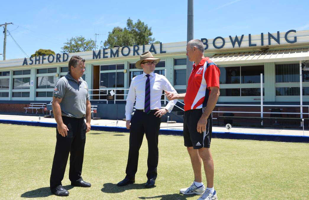 Bowled over: Bowling Club Secretary Manager Mal Allen, Northern Tablelands MP Adam Marshall and Chairman Jason Luckett discuss the new club grant.