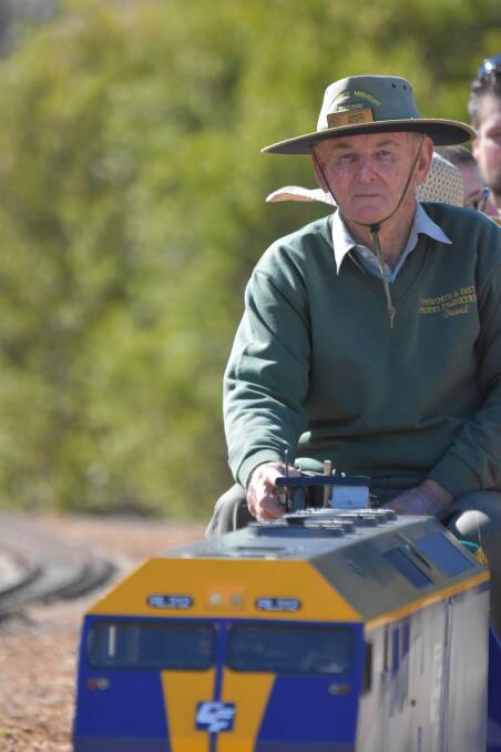 All aboard: TDME president, David Scott, driving a loco on the miniature railway.