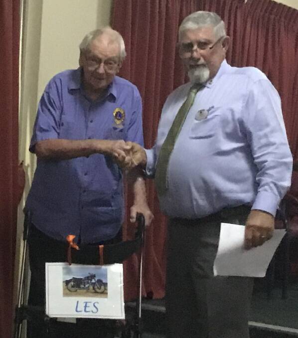 An honour: Les Gardiner was presented with a 60 year Chevron for Service to The Lions Club by Zone 10 Chairman, John Hook. Photo: Supplied.