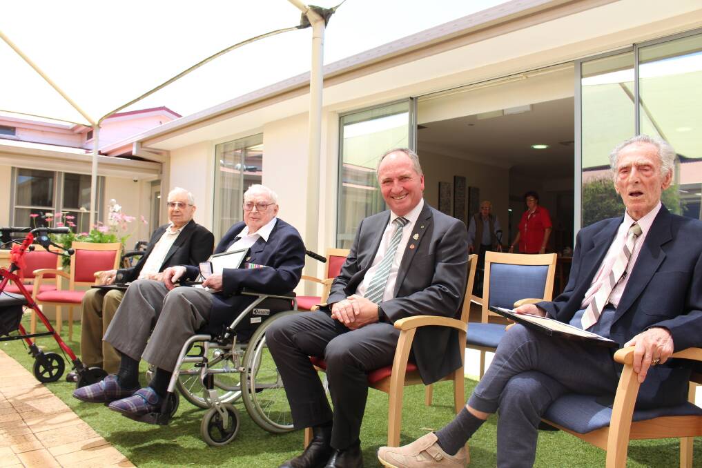 Recognised: WWII veterans Richard (Dick) Orman, Trevor Schwalbach and Stanley Allen with Member for New England, Barnaby Joyce, at Tamworth Masonic Village for the presentation of commemorative medallions. Photo: Supplied.