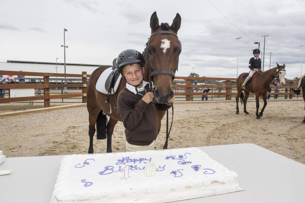 Celebrations: Sam Kelly, nearly 10 himself, helps to mark AELEC's birthday. Photo: Peter Hardin, 121018PHE047