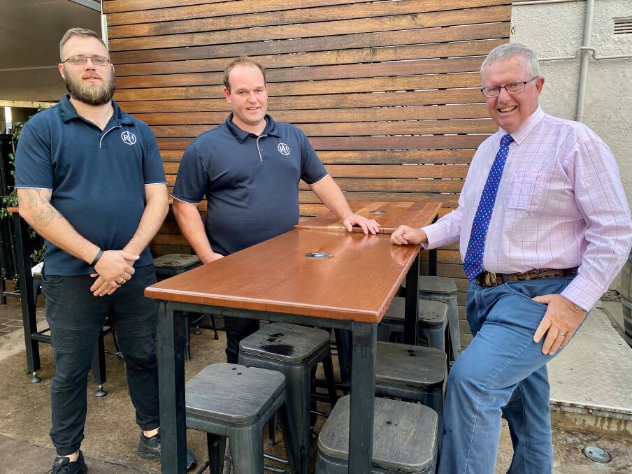 On song: Federal Member for Parkes Mark Coulton pictured with Nick Bradbery and Joshua Launders from the Railway Hotel Gunnedah, which has received a $62,913.40 Live Music Australia grant. Photo: Supplied