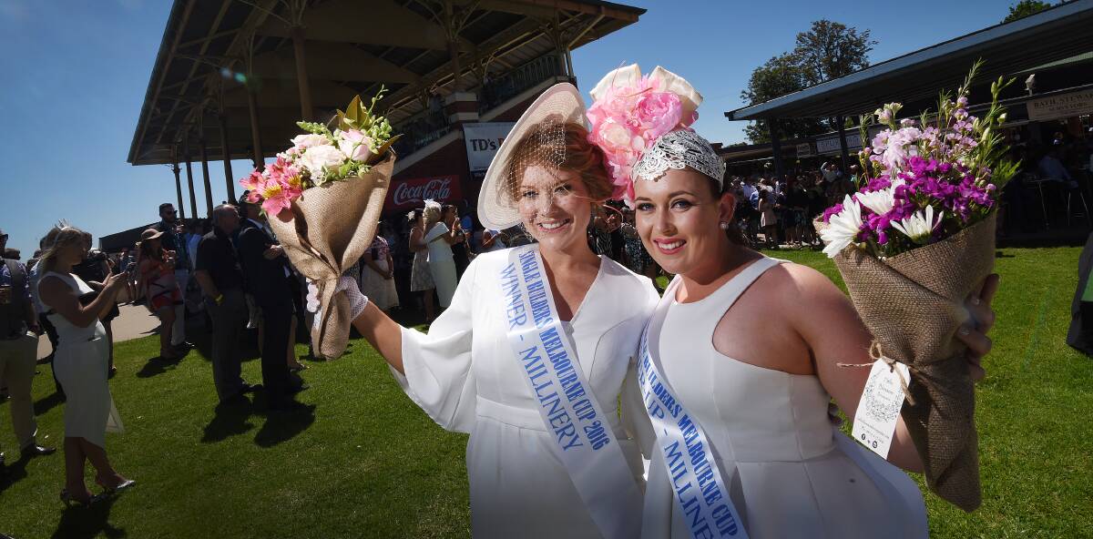 BEST DRESSED: Olivia Dillion and Maddy Woods won the millinery Fashions on the Field. Photo: Gareth Gardner 011116GGC26