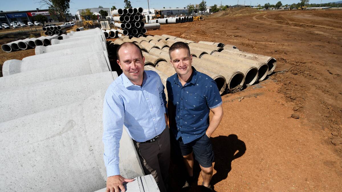 NEW HUB: Gavin Knee and Single Builders construction manager Michael Domer at the new industrial precinct. Photo: Gareth Gardner