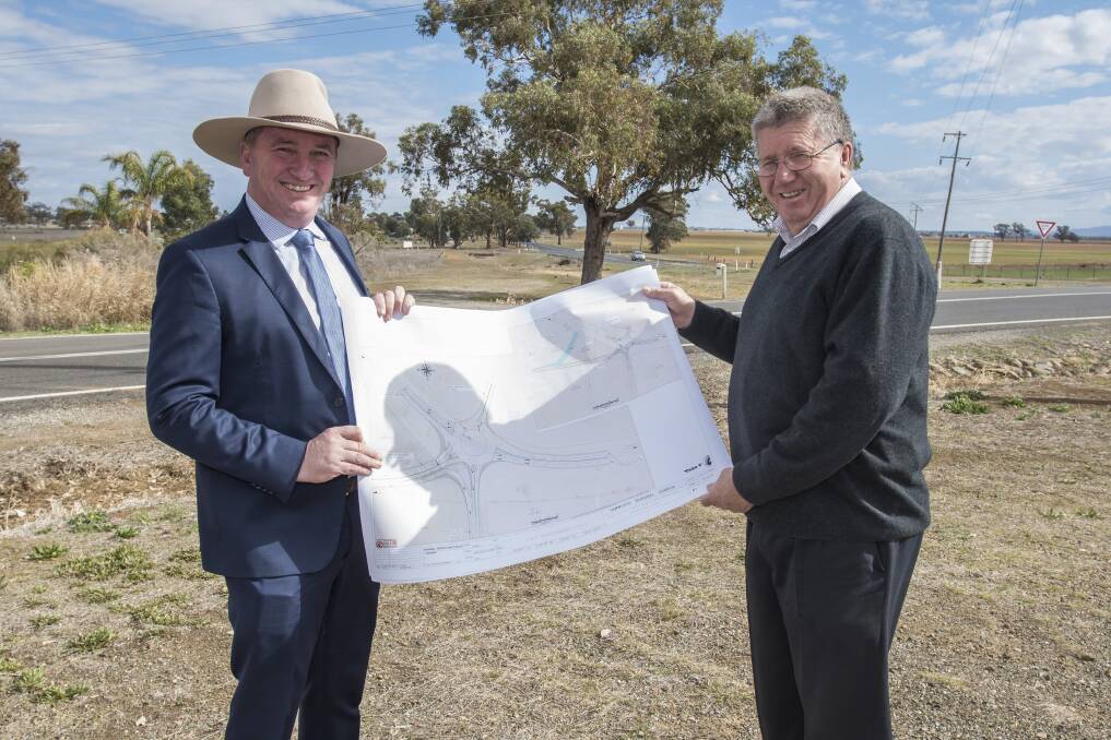 BIG PROJECT: Barnaby Joyce and Col Murray with the plans for the roundabout. Photo: Peter Hardin