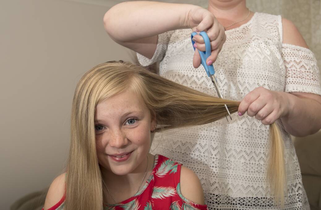 GOOD CAUSE: Addyson Vernon was inspiration to donate her hair, which will be turned in to a wig, after watching a TV show. Photo: Peter Hardin
