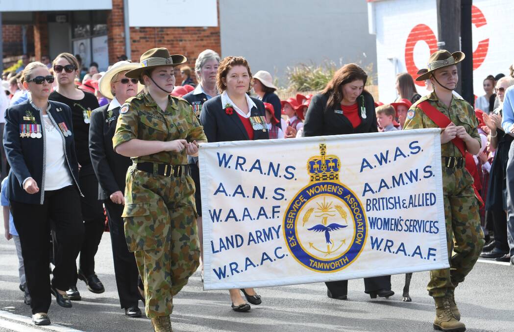 PRIDE OF PLACE: Libby Ryman and Rebecca Linich march up the front with the other ex-servicewomen. Photo: Gareth Gardner