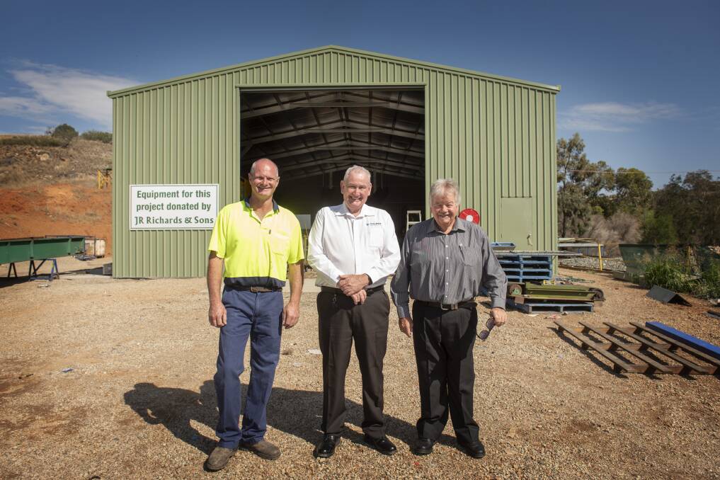 RECYCLED PLANT: Victor Collett, Barry Murphy and Greg Turner outside the new recycling plant, which was donated by a fellow waste processor. Photo: Peter Hardin