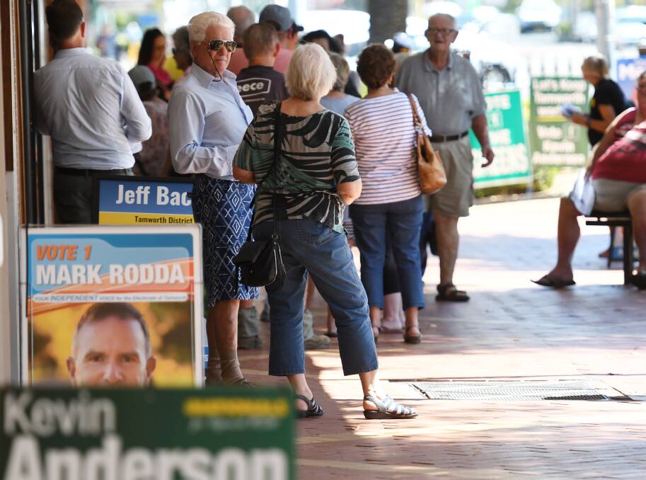 CRUSH TIME: The Tamworth pre-polling booth has been extremely busy and candidates have been camped out the front. Photo: Gareth Gardner