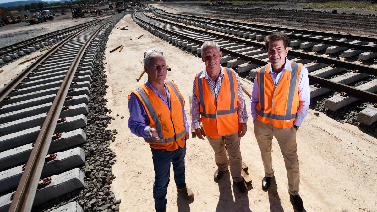 ON TRACK: Andrew Hope, Peter Crawford and Tamworth MP Kevin Anderson at the Werris Creek development, which has been constructed very quickly. Photo: Gareth Gardner