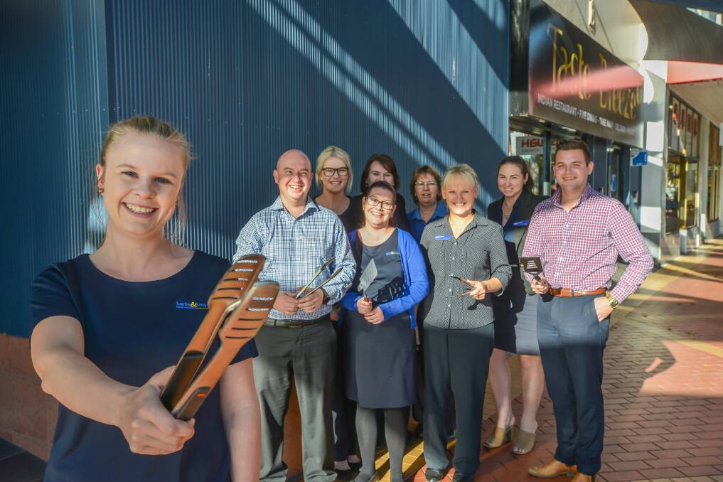AGENTS OF CHANGE: Mel Hussey and the Burke and Smyth team will get behind the barbecue out the front of the agency. Photo: Jamieson Murphy