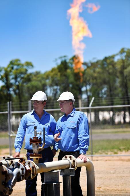 LOCAL NUMBERS: Santos' Todd Dunn and Peter Mitchley at the Narrabri Gas Project. The company says locals will be used whenever possible. Photo: Geoff O'Neill