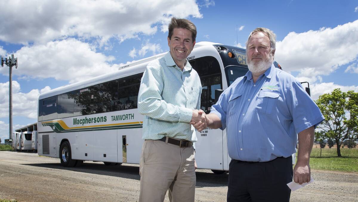 JUMP ABOARD: Tamworth MP Kevin Anderson and Macpherson's Coaches owner Archie Macpherson.