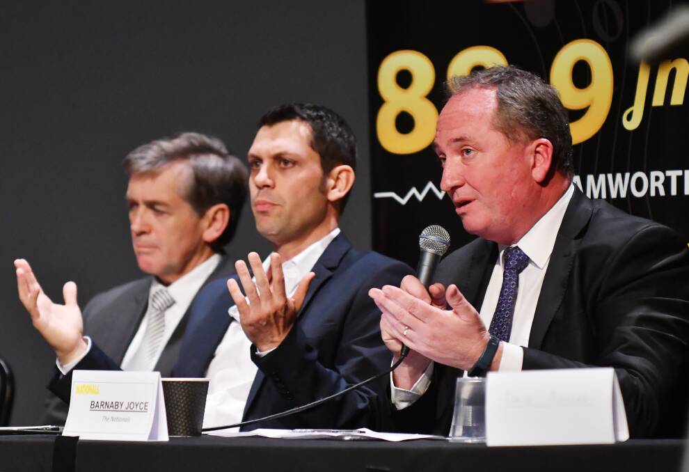 PULLED OUT: Barnaby Joyce at a candidate's debate in 2016, next to then Labor candidate David Ewings. Photo: Barry Smith.
