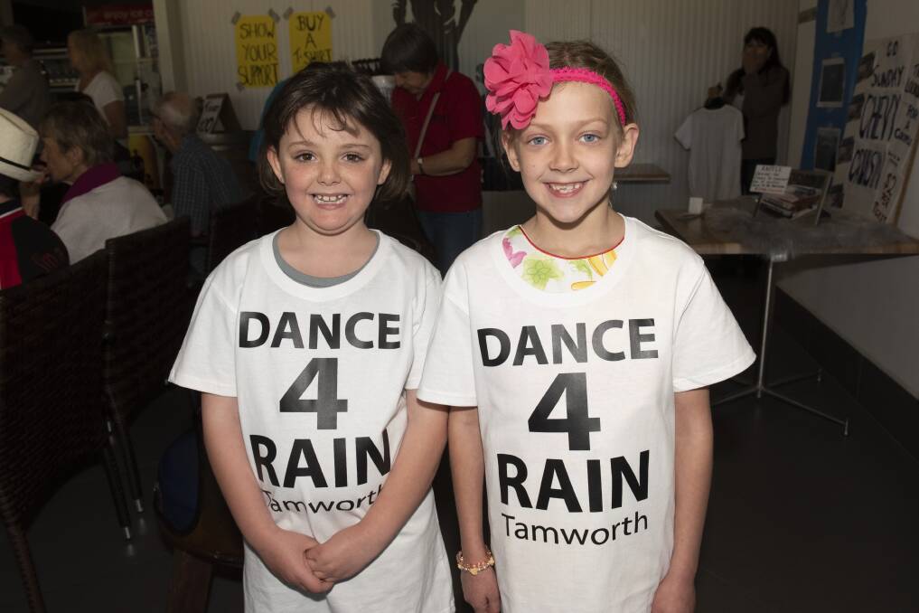 FOR THE FARMERS: Shakiah Elliott and Bella-Rose Tindall modelling the special-edition shirts that were made up and sold to raise money. Photo: Peter Hardin